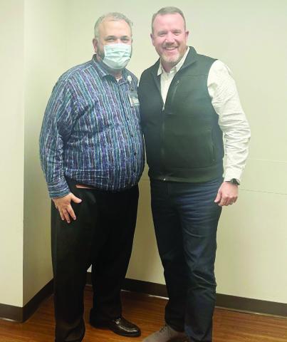 CEO Terry Scoggin and Trinity Senior Pastor Chris Wigley COURTESY PHOTO