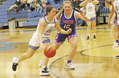Rivercrest’s Stoney Carey drives toward the basket during a recent game. The Lady Rebels took part in the North Hopkins Tournament this weekend. TRIBUNE PHOTO / QUINTEN BOYD