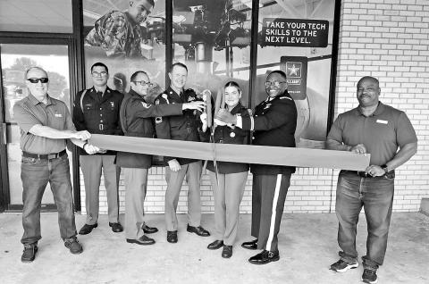 The MP Army Office joined the Chamber of Commerce with a ribbon cutting