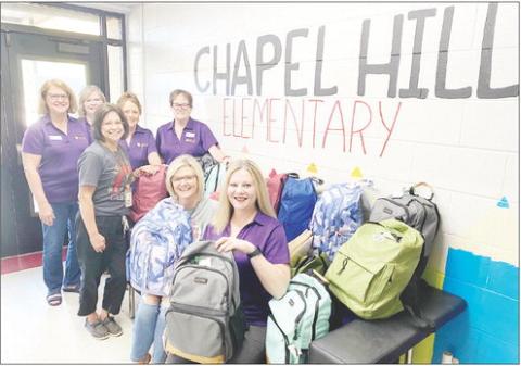 Pilot Club donates supplies, backpacks