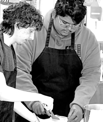 Connor Lewis (left) and Kevin Cigarroa mix their icing to flood consistency Courtesy Photo