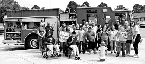 MPHS students with the fire truck at the end of the presentation