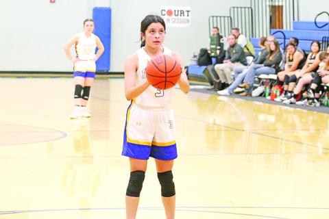 Alexa Arzate prepares to shoot a free throw during the Lady Bulldogs’ game against Ore City last week. The Lady Bulldogs dropped their two games last week, falling to the Lady Rebels and Avinger.