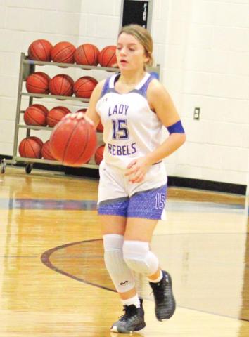 Lady Rebels defeat CHESS, fall in district opener and in Monday matinee