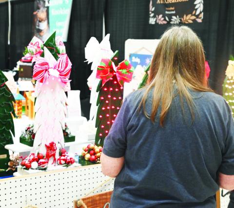 The Mount Pleasant - Titus County Chamber of Commerce hosted their annual Deck the Halls bazaar at the Mount Pleasant Civic Center Friday and Saturday, offering an opportunity for local Christmas shopping. For more photos, see page 11. TRIBUNE PHOTO / MIRANDA OGLESBY