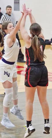 Madison Manning puts up a shot over a Mount Vernon player. The 11th-ranked Chapel Hill Lady Devils defeated the Lady Tigers, 36-27, and took on 18th-ranked Winnsboro Tuesday.