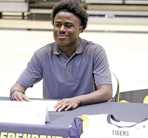 Tiger trio heads to next level on National Signing Day