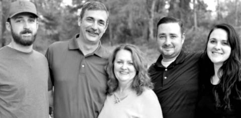 Pictured (left to right): Jacob, a Wildlife Biologist; Bill, her husband; Jackie; Bill, a Flight Paramedic; and Sarah, a Financial Manager. COURTESY PHOTO