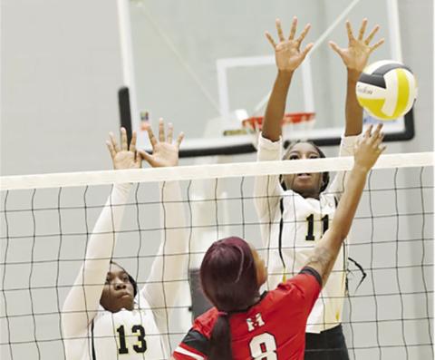Aziyah Farrier and Autiuana Johnson go up for the block. COURTESY PHOTO / JOHN WHITTEN