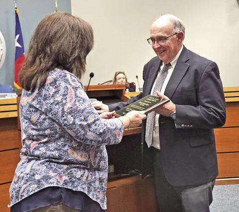 Kerry Wootten receives award from the city for his 42 years of service as city attorney TRIBUNE PHOTO / NICOLE KIMBALL