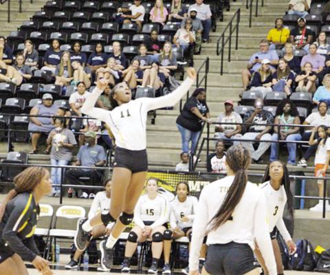 Lady Tigers outlasted by Pine Tree to open district