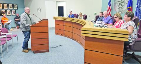 John Ankram talks to the city council about possible structure demolitions
