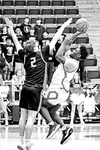Nemo Savage shoots over a Lovejoy defender