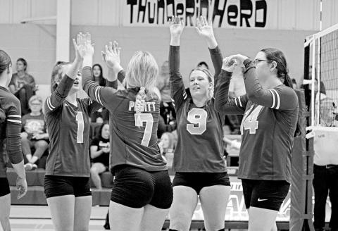 From left, Pewitt’s Avery Perry, Makenzie Bottoms, KK Jackson and Hally Taylor celebrate during a recent match. The Lady Brahmas are currently in fourth place and will play the final match of the first round of district play Friday at Redwater. TRIBUNE PHOTO / QUINTEN BOYD