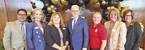 NTCC leaders pose with their retiring president, Dr. Ron Clinton