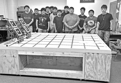 Mount Pleasant High School students with one of the tables they built for MPISD Elementary Robotics COURTESY PHOTO