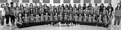 MPHS CIS Coordinators Kelsey Cameron, Juliana Flores, and the MPHS Tiger Dolls with some of the items collected. COURTESY PHOTO