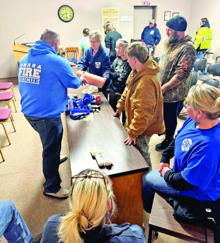 EMS worker shows how to stop a bleed and hands-only CPR COURTESY PHOTO / TITUS REGIONAL EMS
