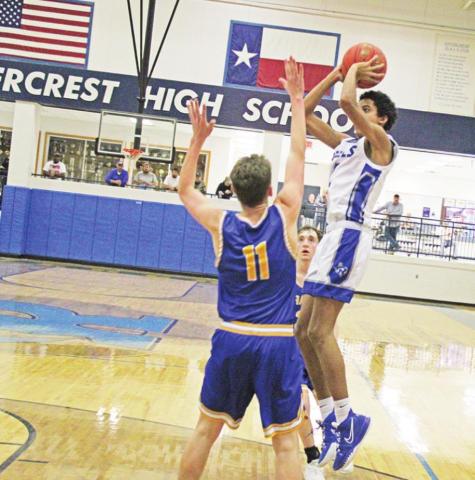 Rivercrest’s Tre Williams takes a shot during a recent game. The Rebels opened the playoffs Tuesday evening against Como-Pickton. TRIBUNE PHOTO / QUINTEN BOYD