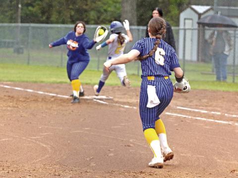 Harts Bluff’s Kylie Cancino makes the catch off the throw by Peyton Cameron to nail James Bowie’s Alleyah Franco for the out. The Lady Pirates won over the Lady Bulldogs Tuesday, 11-1. TRIBUNE PHOTO / QUINTEN BOYD