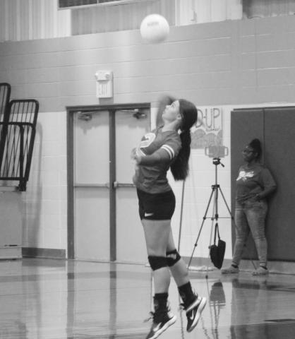 Ashtyn Boyd attempts to serve an ace during a recent game. TRIBUNE PHOTO / QUINTEN BOYD