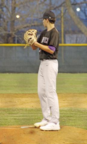 CHAAMP’s David Harrison checks the runner at second. Harrison pitched 5 2/3 innings and allowed only two hits. COURTESY PHOTO