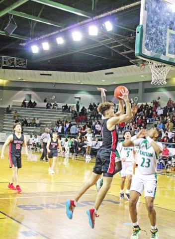 Chapel Hill’s Jabo Zachry puts up a shot during Friday’s area round game against Tatum. COURTESY PHOTO