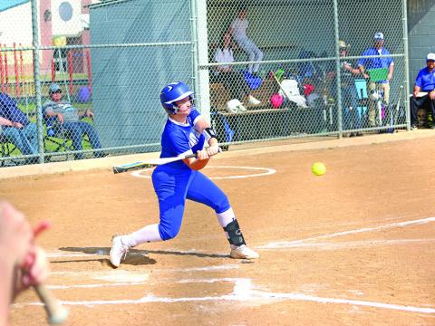 Rivercrest’s Avery Martin swings during Monday’s game against Sulphur Bluff. Martin went 3-3 with an inside-the-park home run, five RBIs and four runs scored in the Lady Rebels’ 15-0 win. TRIBUNE PHOTO / QUINTEN BOYD
