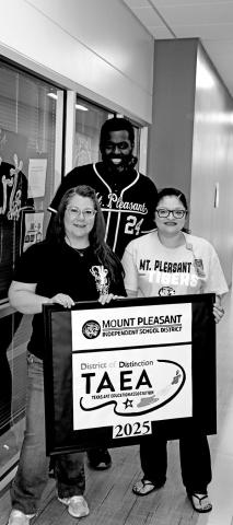 Accepting the TAEA District of Distinction for MPISD (L to R) MPHS art teacher Laura Kirkland, MPISD Director of Fine Arts Theodus Luckett III, MPJH art teacher Blanca Hernandez