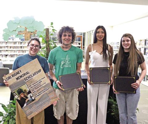 From left to right: Library Director Lupe Herrera, Maddox Lynch, Madelain Salazar, and Phenyx Reust.
