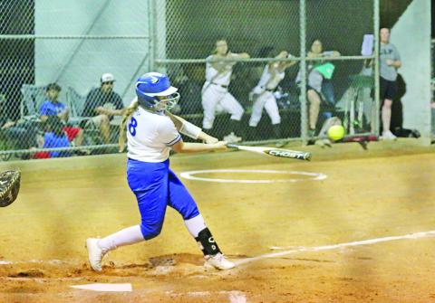 Avery Martin connects on a swing during a recent game. The Rivercrest Lady Rebels traveled to Saltillo Tuesday and will host Sulphur Bluff at 11 a.m. Saturday. TRIBUNE PHOTO / QUINTEN BOYD
