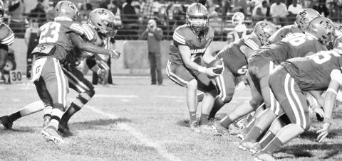 The Pewitt offense runs a play during the Brahmas 42-6 loss to Daingerfield. TRIBUNE PHOTOS / TONI WALKER