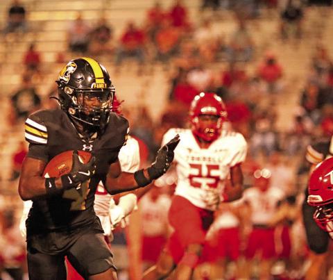 Jerimaih Johnson finds a crease in the Terrell defense and races 44 yards for a Mt. Pleasant touchdown.