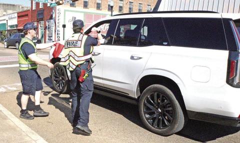 Mount Pleasant Fire Department collects donations during fundraising event.