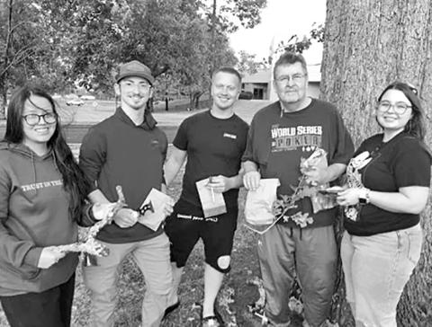Pictured: Amy Vazquez, Kaden Groda, Garrett Phillips, Honors Biology Professor Dr. Chris McAllister, and Alison Majors Collecting Samples COURTESY PHOTO