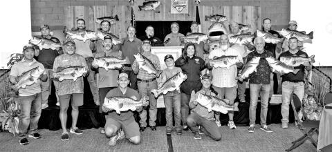 Legacy Lunker donors receive a free fiberglass replica of their catch from Lake Fork Taxidermy, ShareLunker clothing, a Bass University subscription and other goodies. Anglers also are entered in a pair of year-end drawings for $5,000 shopping sprees. Pictured here are the 17 anglers responsible for 18 entries last season. The fish produced about 190,000 fingerlings. (TPWD Photo)