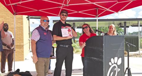 Byron Patton receives award for saving a life with the Heimlich TRIBUNE PHOTO / NICOLE KIMBALL