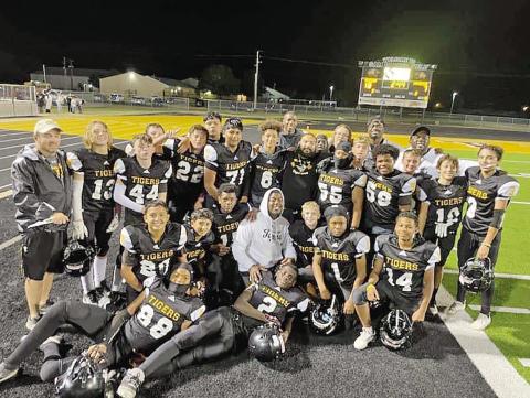 The 7th grade Tiger football team won the district championship on Tuesday, November 5, capped off with an undefeated season. They are coached by Will Hallonquist, Jared Elliott, Jakeivian Hughes, Hugo Uribe, Josh Morris, Jackie Ouzts, Ira Franklin, and Joel Guerrero. COURTESY PHOTO
