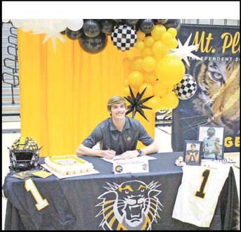 COURTESY PHOTO Mason McMinn signed his letter of intent with Fort Hays State in Hays, Kan. The NCAA Division II Tigers are part of the Mid-America Intercollegiate Athletics Association and finished 7-4 last season.