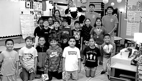Brice Avila Farias: Back row (L to R) Carmelita Perez, the Chick-Fil-A Cow, Alberto Avila, and Angel Farias with Mrs. Perez’s 3rd grade class at E.C. Brice