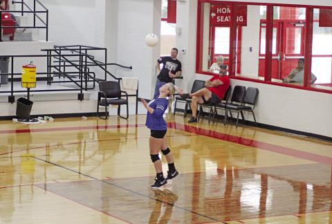 Pewitt’s K.K. Jackson prepares to serve during Saturday’s scrimmage against Hughes Springs.