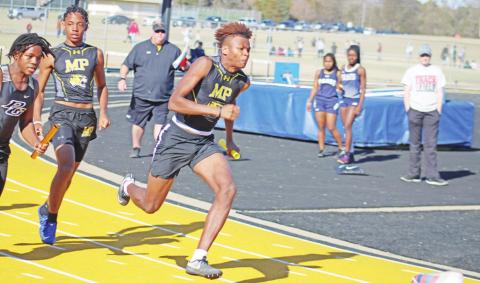Antez Jeffery takes off during the final leg of the JV boys 4x100 meter relay at Thursday’s Mount Pleasant Invitational. TRIBUNE PHOTO / QUINTEN BOYD