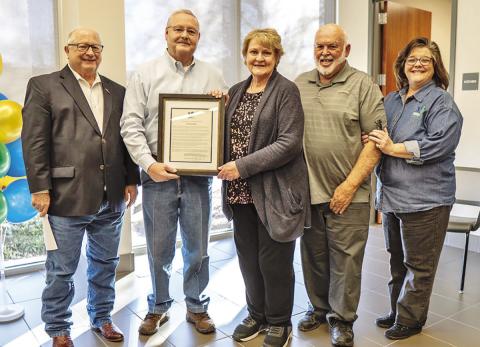 From left, City Manager Ed Thatcher; Mayor Pro Tem Tim Dale who issued a proclamation in Helen Thompson’s honor; Mrs. Thompson; her husband, Gaylon Thompson; and Councilmember Sherri Spruill.