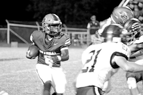 Pewitt running back KD Watson searches for room on a carry during Friday’s game. The Brahmas will open district play at home against Hooks Friday.