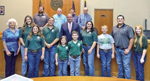 Titus County 4H Club poses with Titus County Commissioners Court after telling them about the State Fair competition COURTESY PHOTO / CASE RODGERS