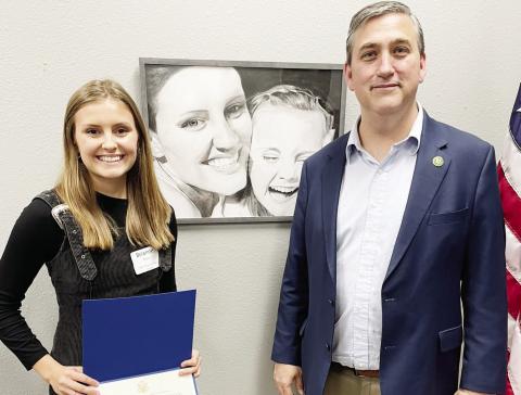 Brianne Davis with her Honorable Mention award and Congressman Nathaniel Moran. COURTESY PHOTO