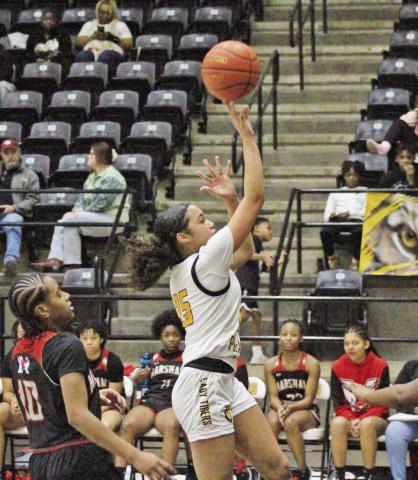 Mount Pleasant’s Kaylin Brannon puts up a shot during the Lady Tigers’ game against Marshall. The Lady Tigers picked up the home win over the Lady Mavs, 52-42. TRIBUNE PHOTO / QUINTEN BOYD