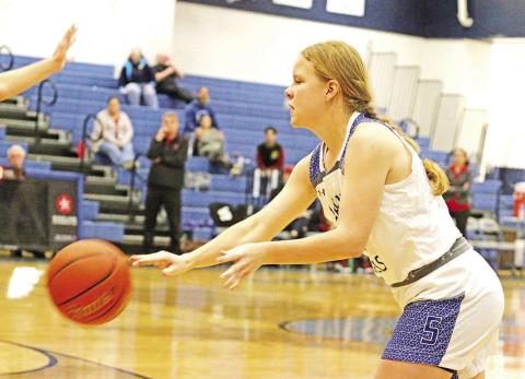 Rivercrest’s Claire Grider delivers a pass during a recent game. The Lady Rebels looked to remain undefeated in district play Friday at home against James Bowie. TRIBUNE PHOTO / QUINTEN BOYD