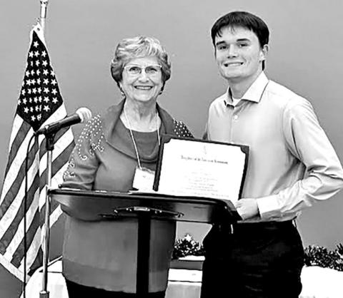 Tanner Marshall (right) with DAR representative Yvonne Hampton at the DAR awards banquet COURTESY PHOTO