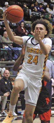 Carter Chism and the Mount Pleasant Tigers ran their district record to 3-0 Friday with a home win over Texas High. Mount Pleasant hosted Pine Tree Tuesday and will travel to co-district leader Longview Friday. TRIBUNE PHOTO / QUINTEN BOYD